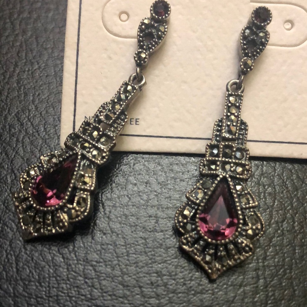 Silver tone stud earrings